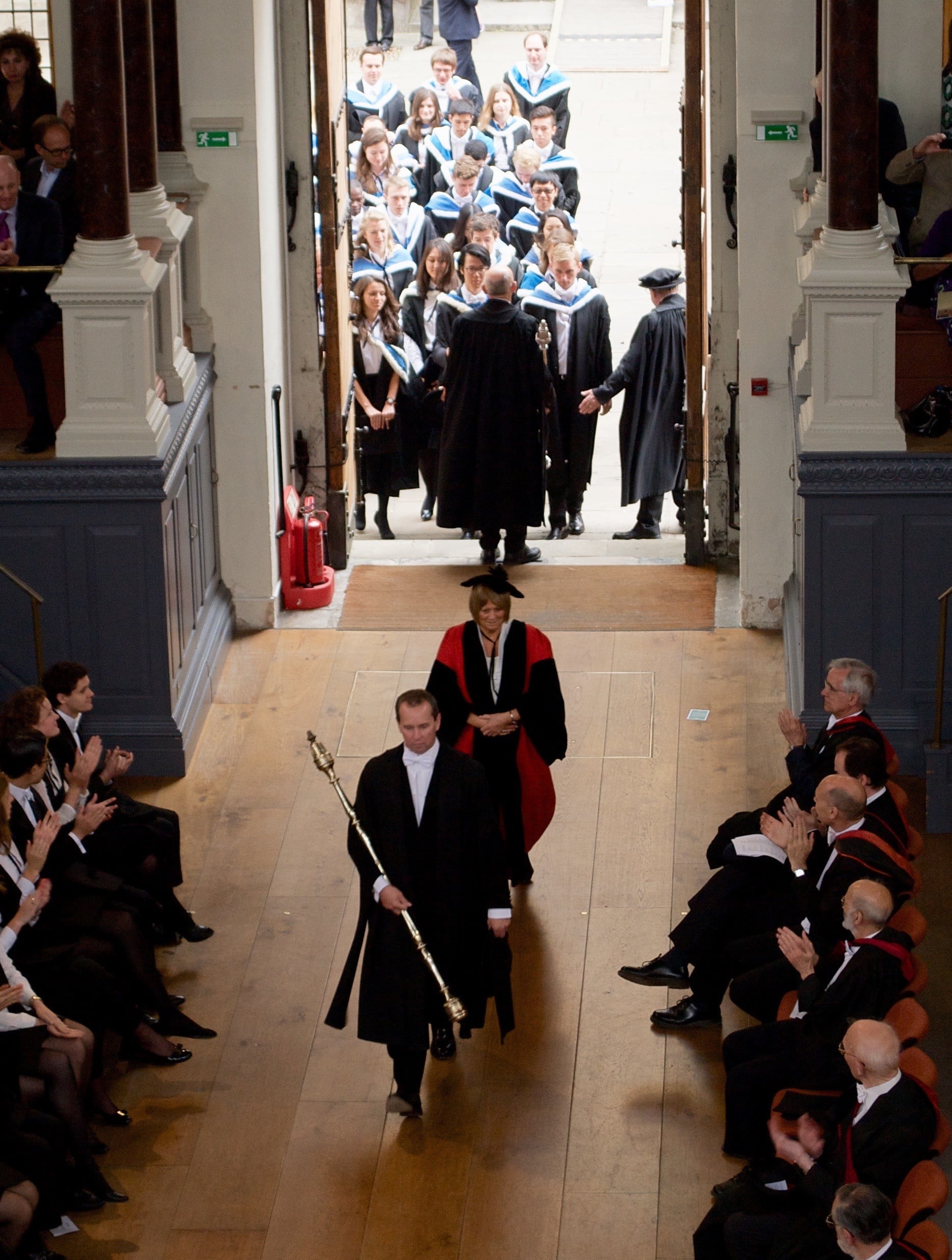 Sue Gillingham enters the Sheldonian Theatre during her graduation ceremony