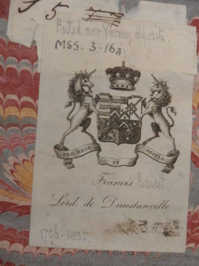 Bookplate of Sir Francis Basset with heraldic crest.