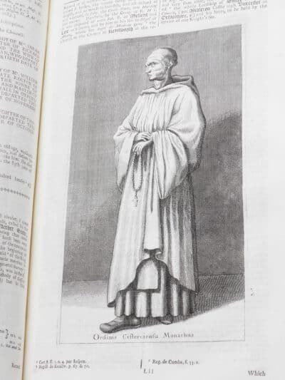 Black and white illustration of a Cistercian monk.