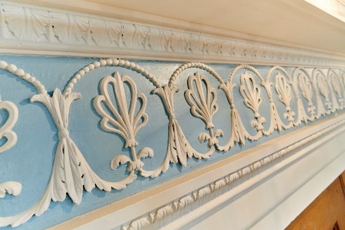 Detail of blue and white plasterwork decoration.