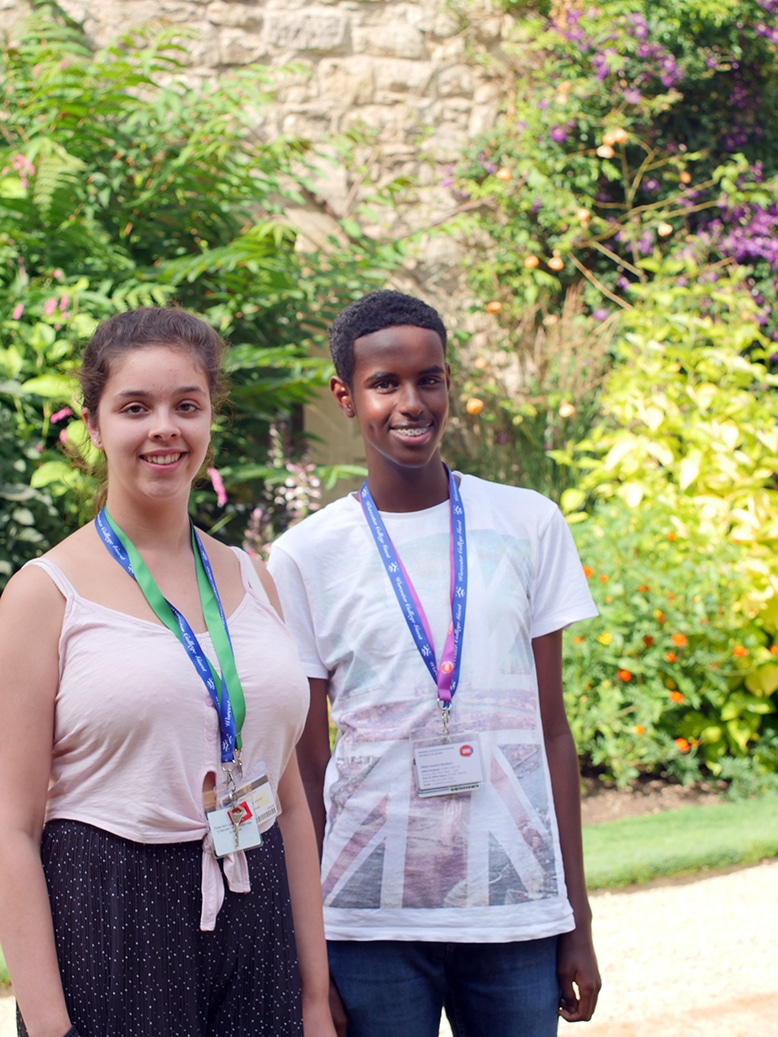 Two UNIQ students in the gardens
