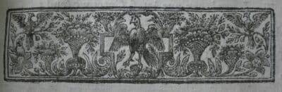 Floral printer's ornament, with a bird, wings outstretched, in the centre.