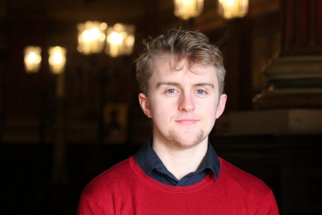 Headshot of Giles Longstaff