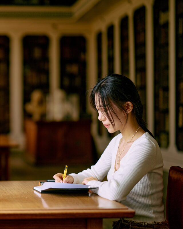 Student working in the library