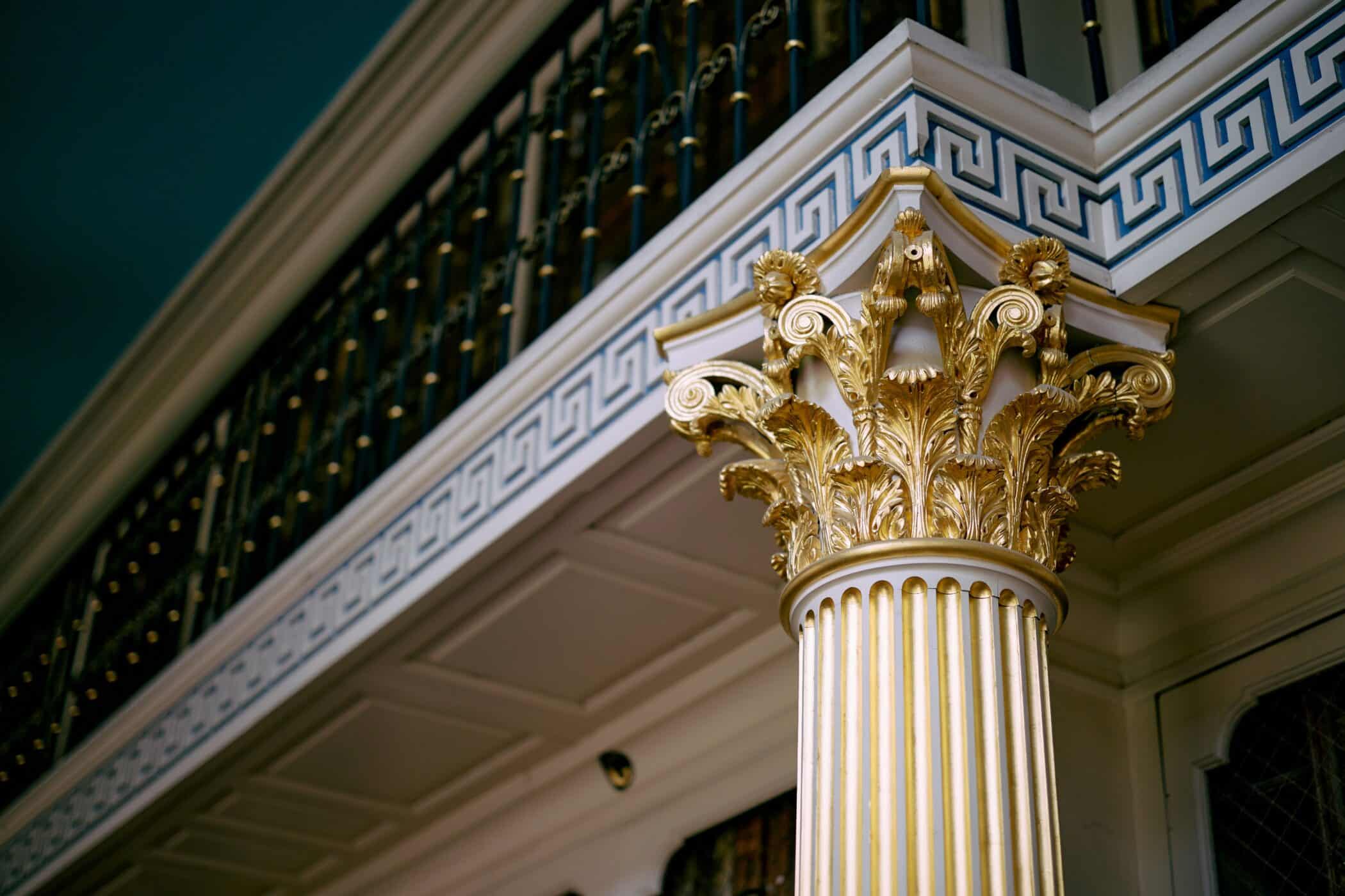 Corinthian column with gold leaf