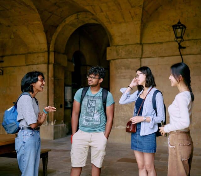 Students talking in stone walkway