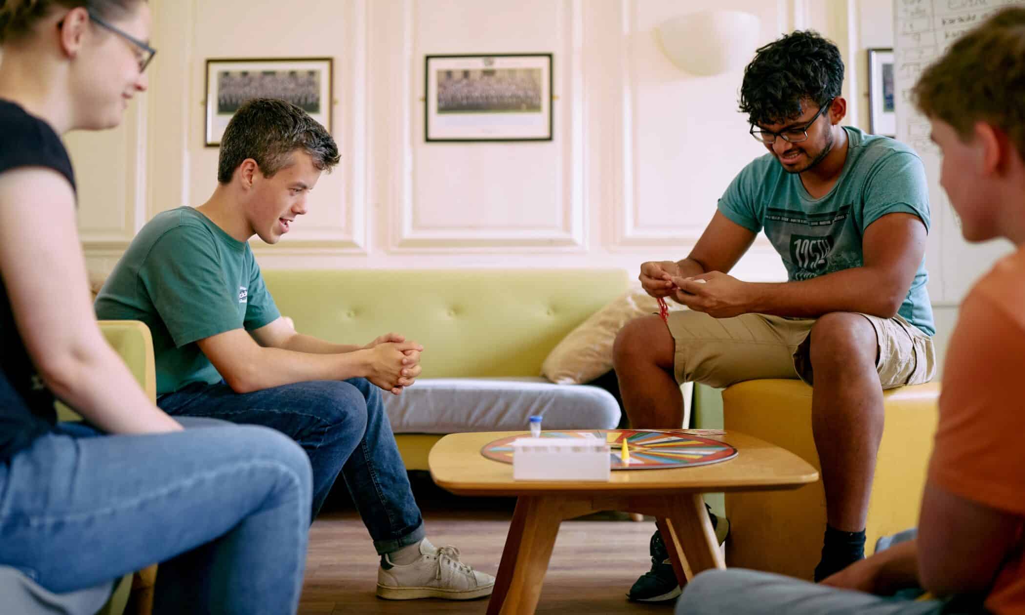 Students playing a board game