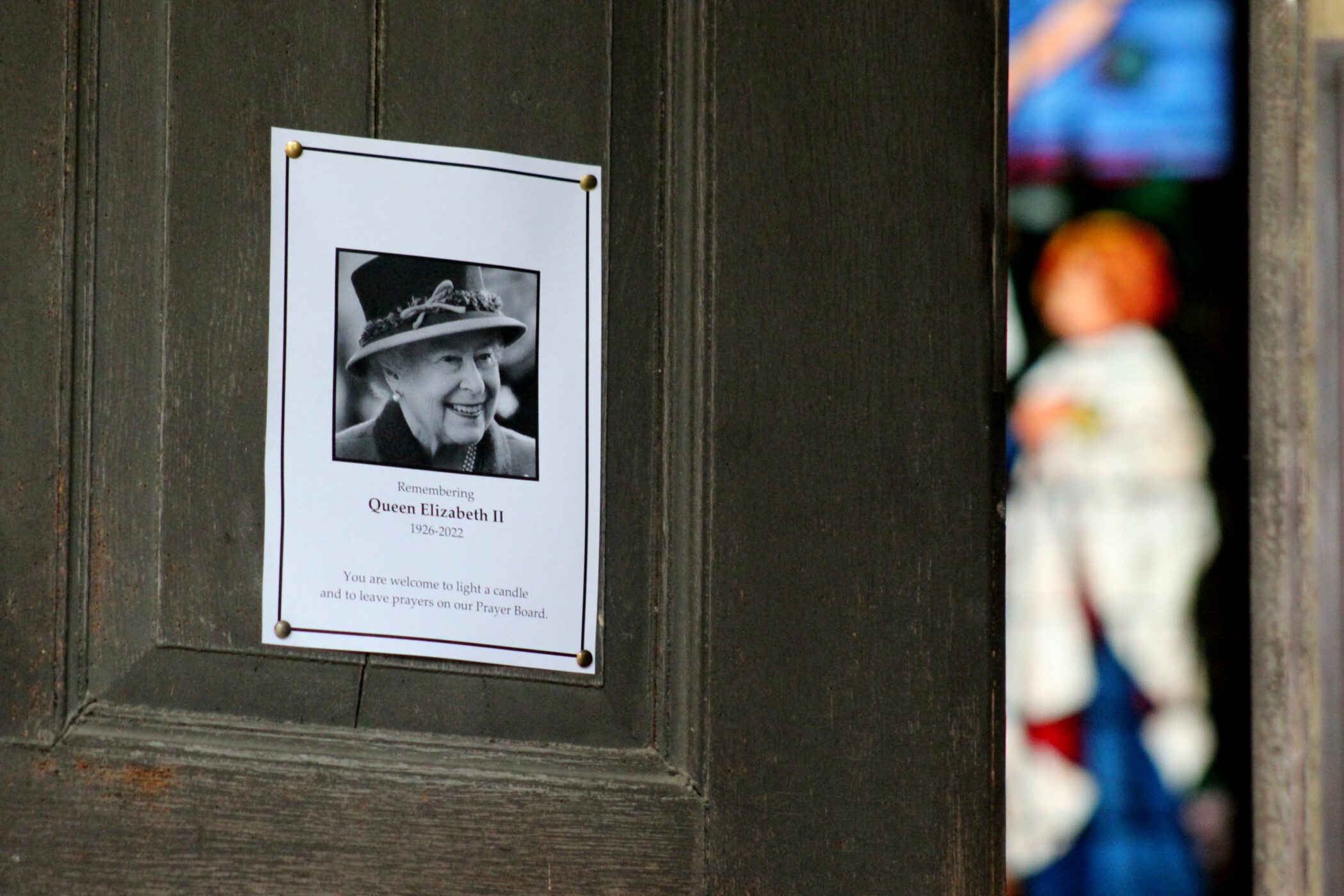 Poster announcing death of Queen Elizabeth II on chapel door