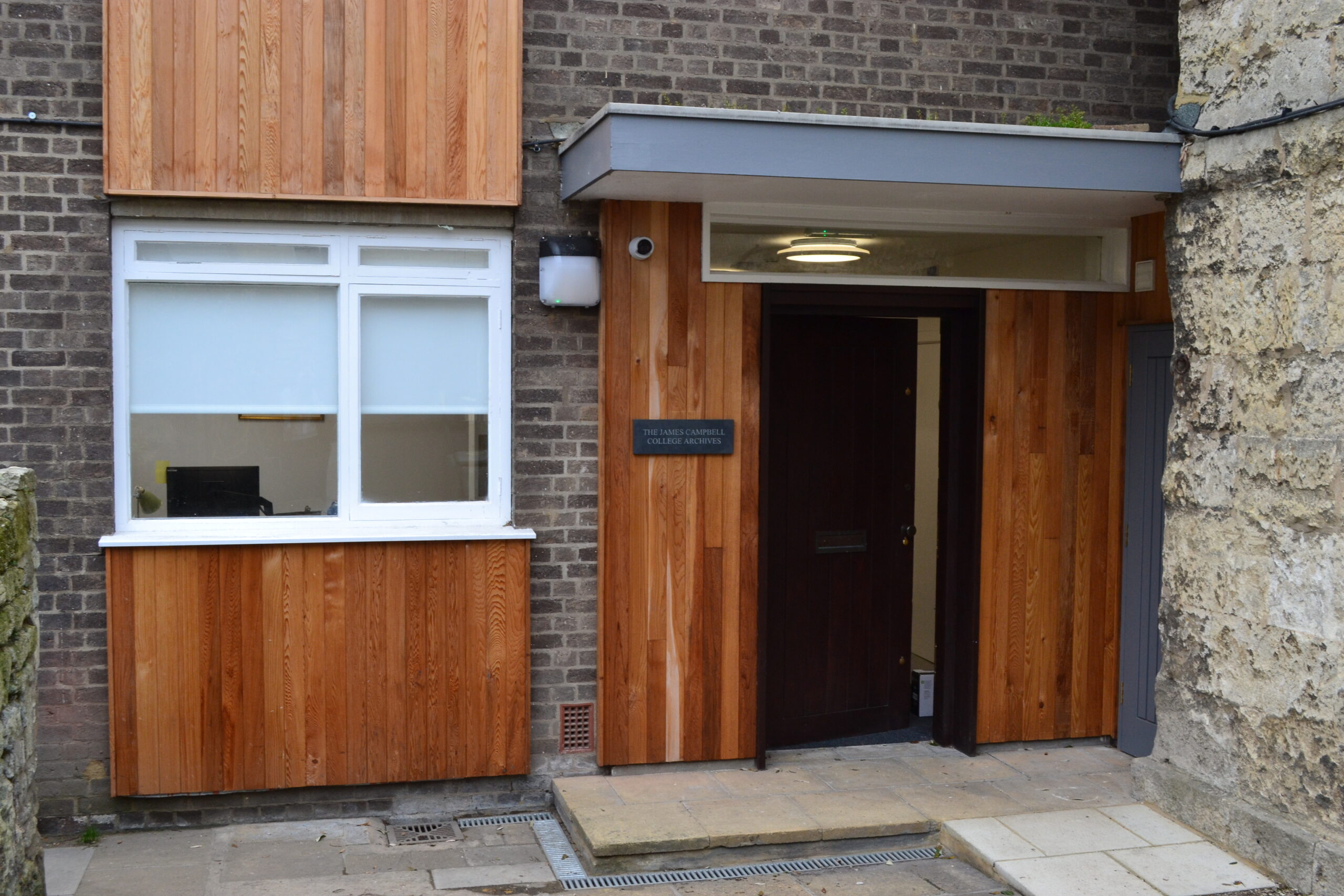 Photograph of the entrance of the James Campbell College Archives building.