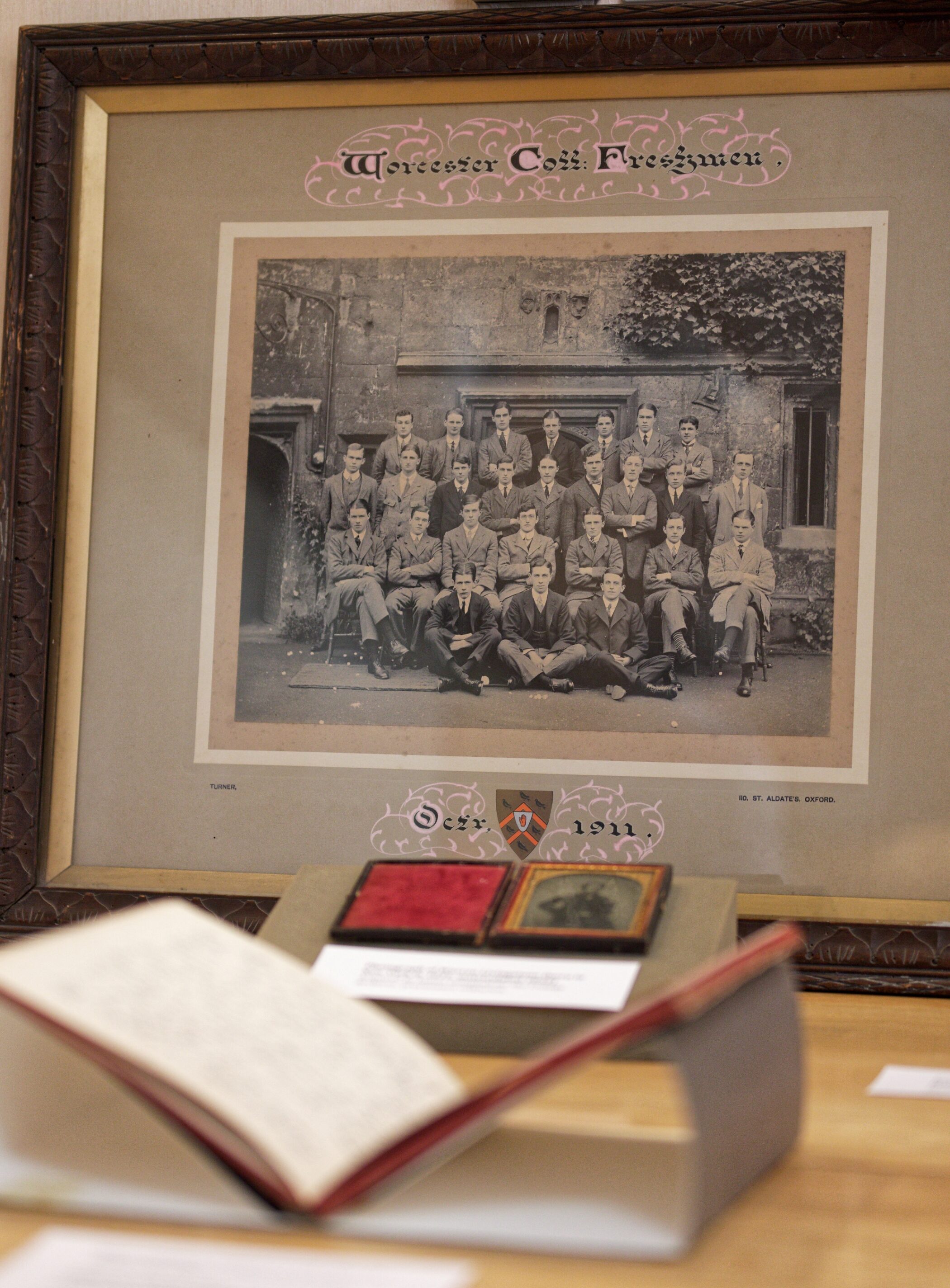 Archive display with 1911 matriculation photo