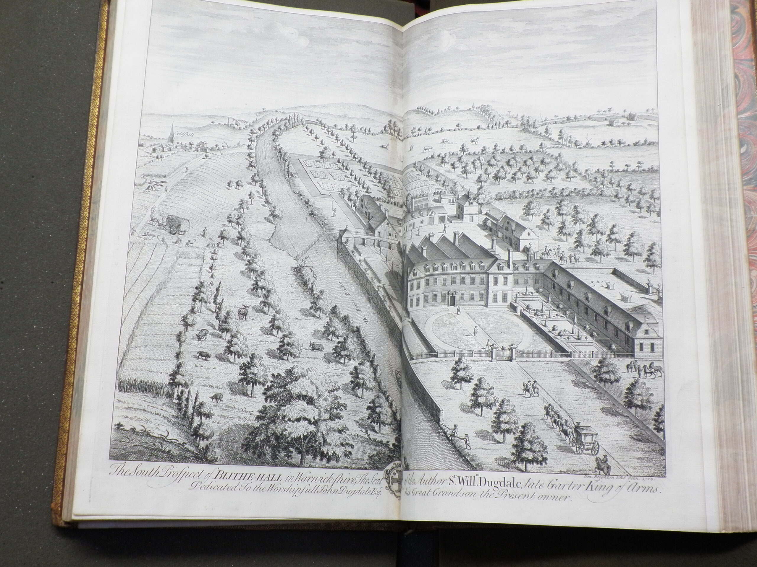 Black and white engraving showing a bird's-eye view of Blyth Hall, set in the countryside.