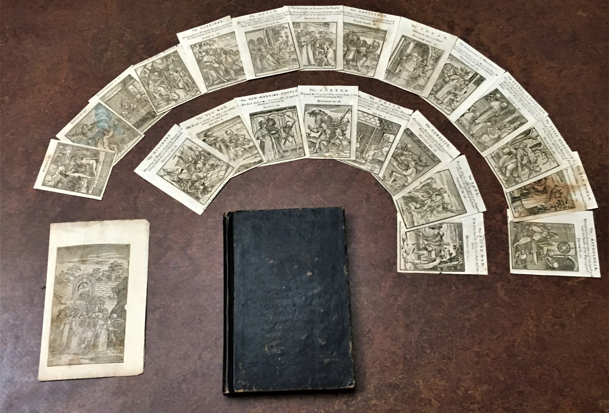 Photograph of a fragment of the Office of the Dead, consisting of 13 leaves of vellum, from a Book of Hours for the use of Rome, together with a set of woodcuts featuring the Dance of Death.