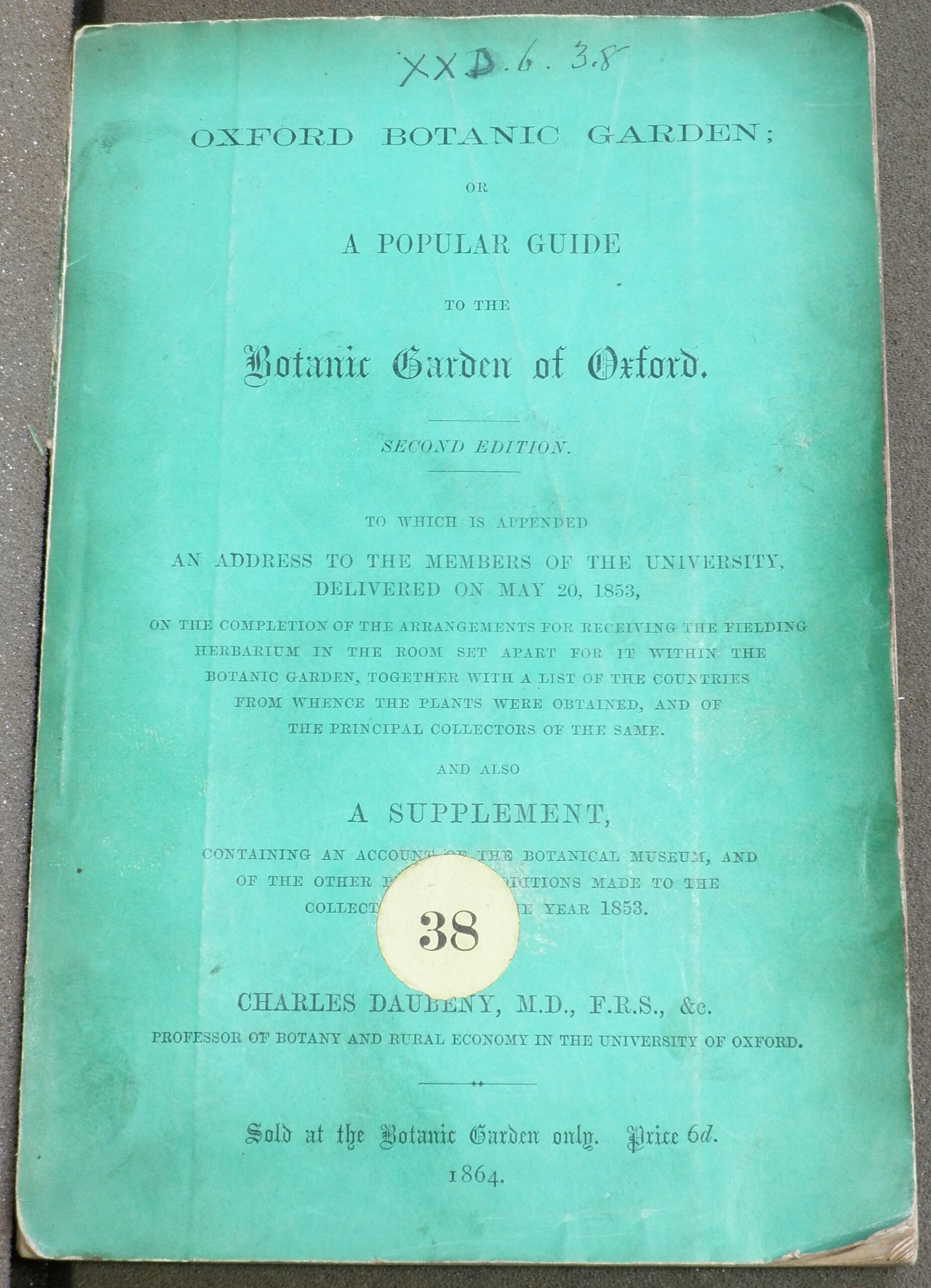 Front cover of 'A Popular Guide to the Botanic Garden of Oxford'. A green paper binding.