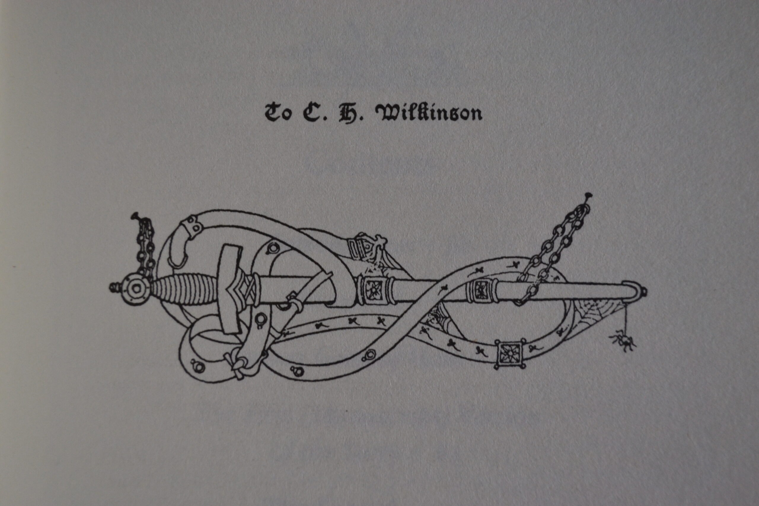 Printed dedication to C.H. Wilkinson, with a woodcut of a sword in a scabbard.