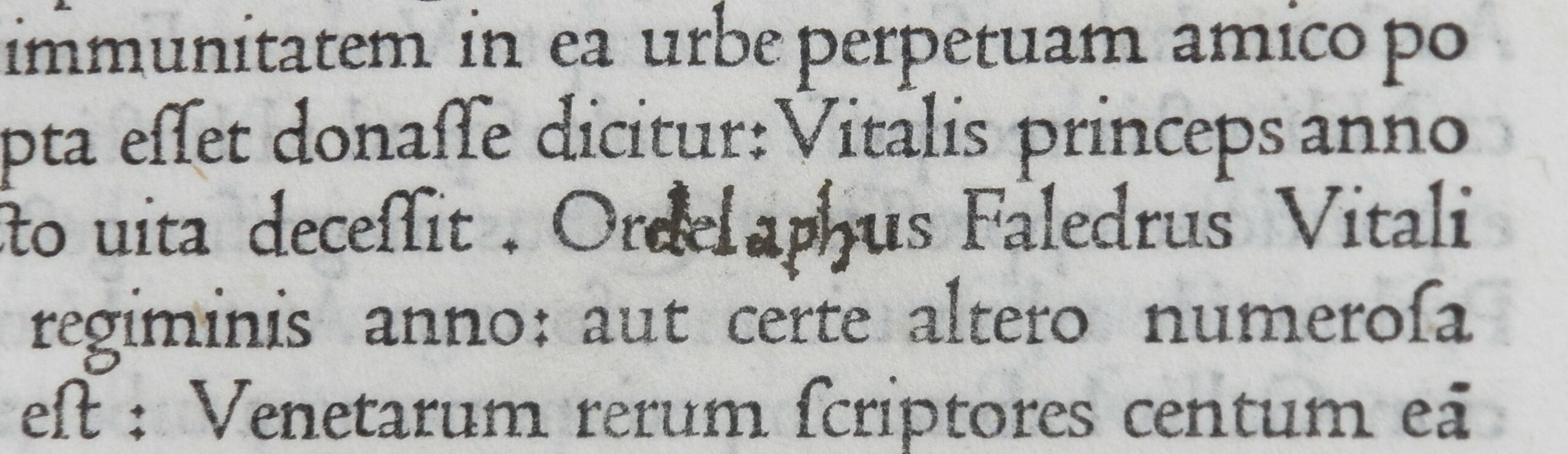 Detail of printed text showing handwritten corrections.