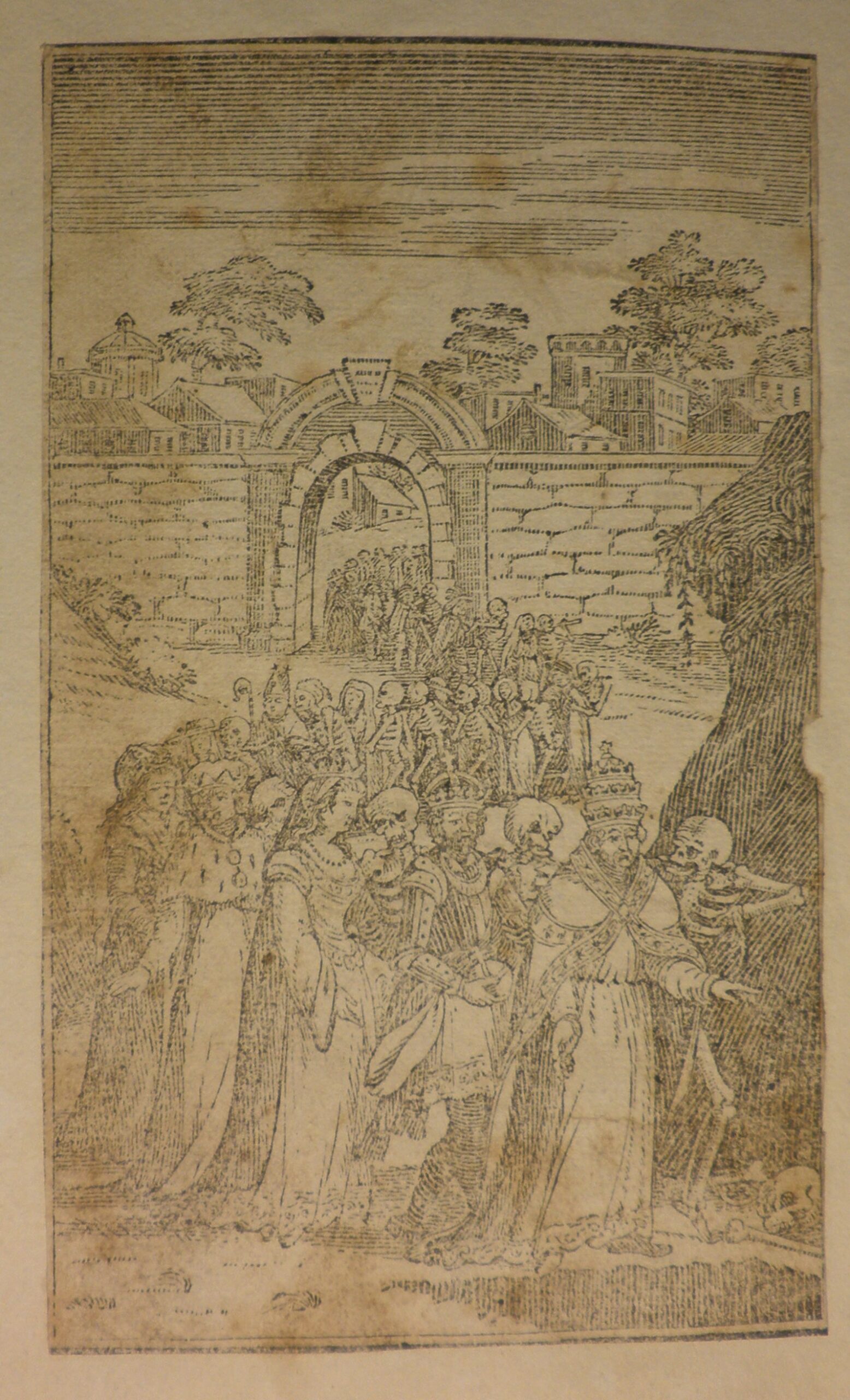 Woodcut image of a procession of figures being led by skeletons.