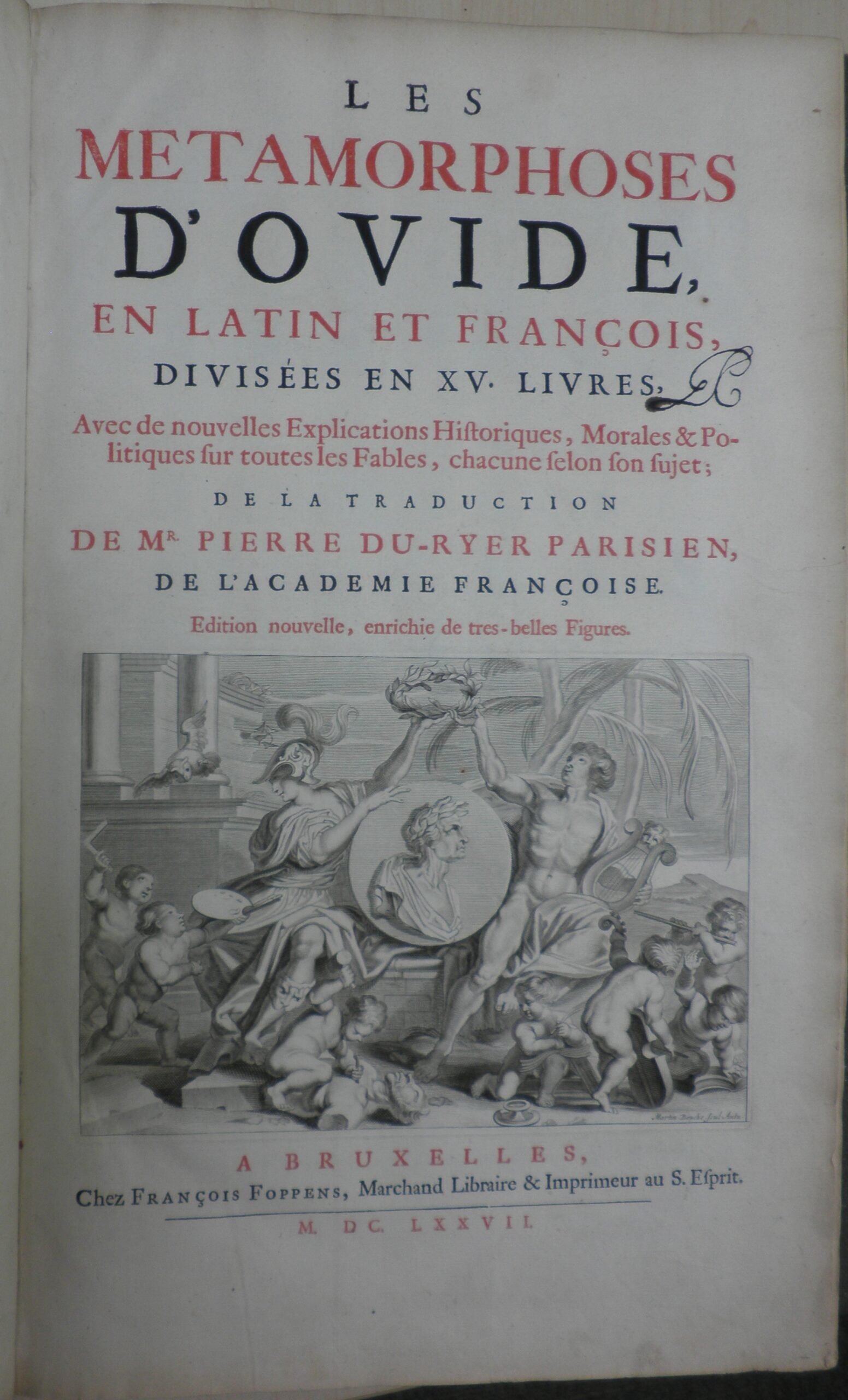 TItle page of 'Les Metamorphoses d'Ovide'. The text is in red and black and the page bears George Clarke's monogram.