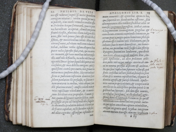 Printed pages with underlining and annotations in the margins.