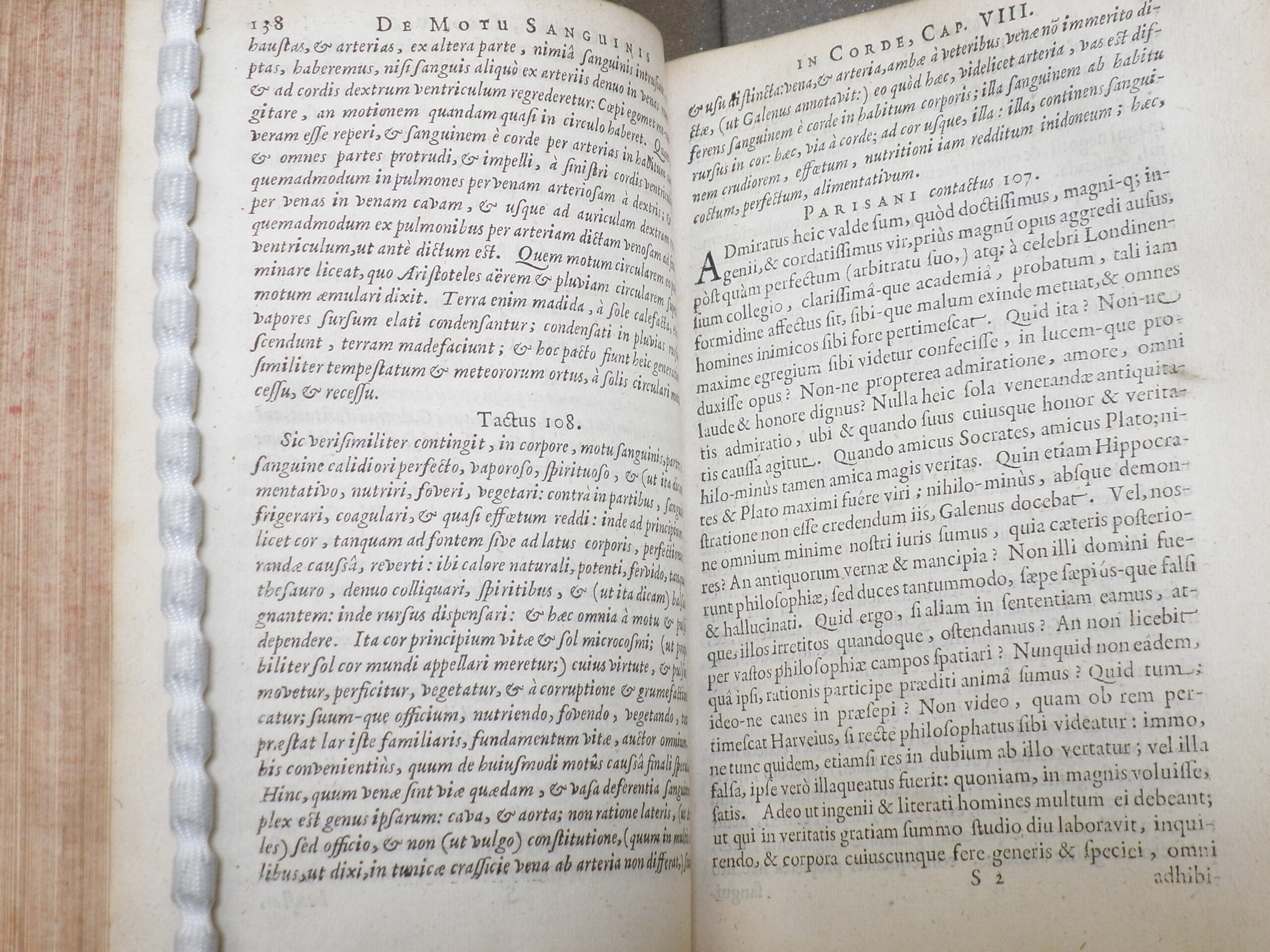Photograph of book showing Harvey's text and refutations of Parisanus alternating.