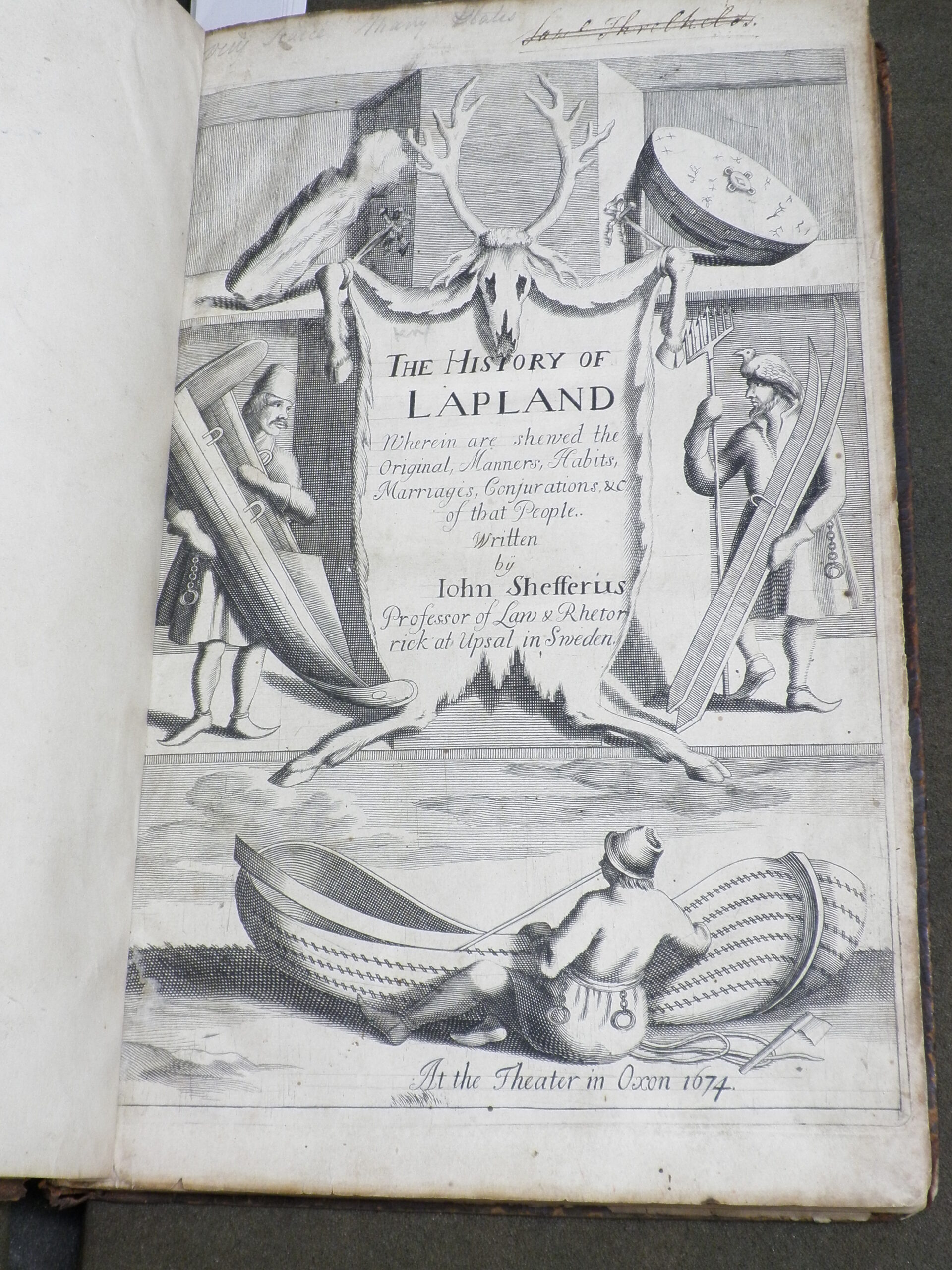 Title page of the History of Lapland, illustrated with figures holding skis, a sled, and a canoe.