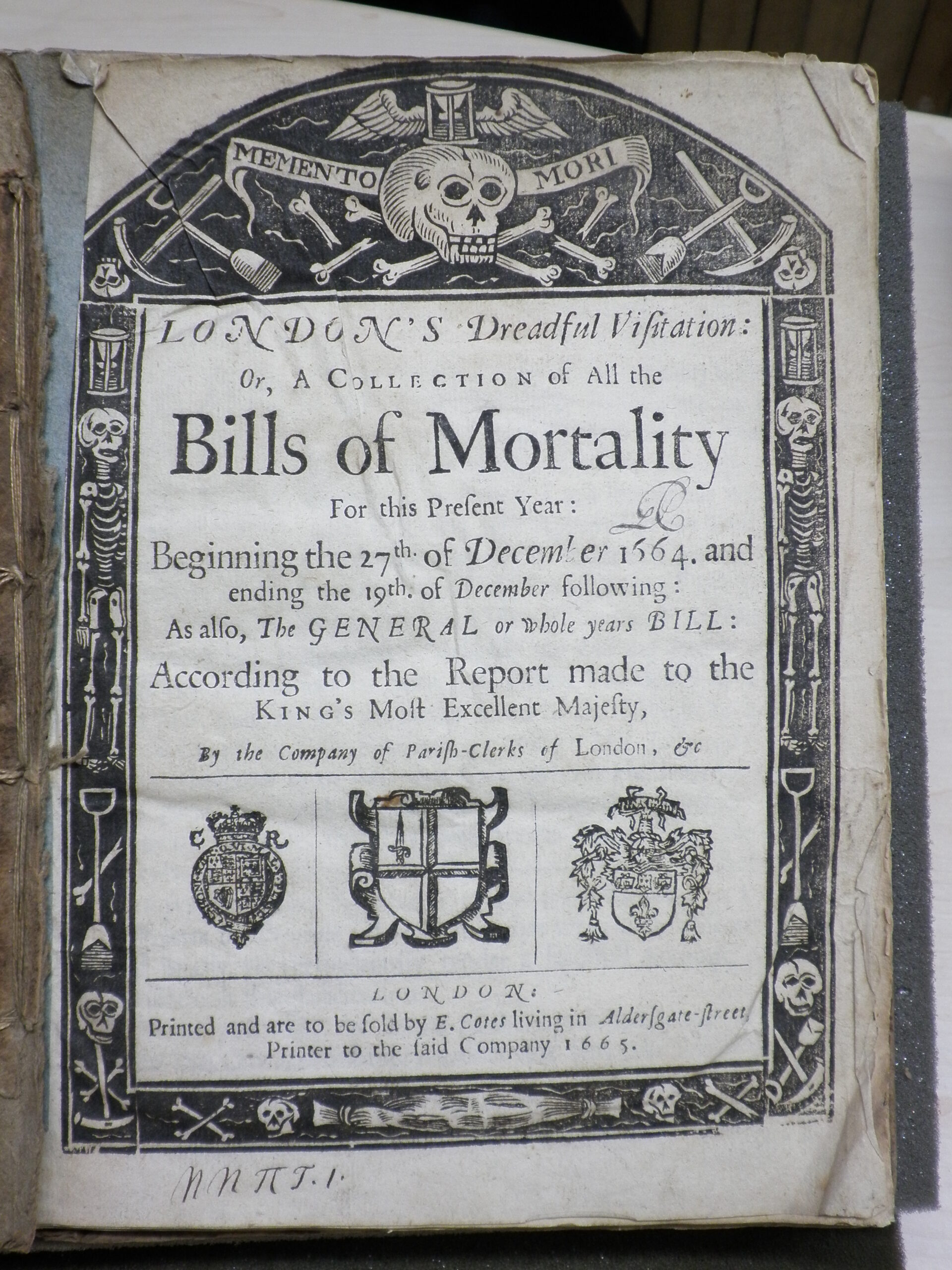 Title page of the Bills of Mortality with a morbid woodcut border.