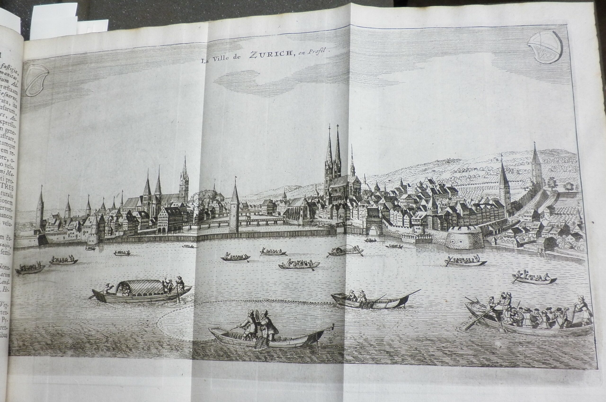 A fold-out engraved image showing a panorama of Zurich.