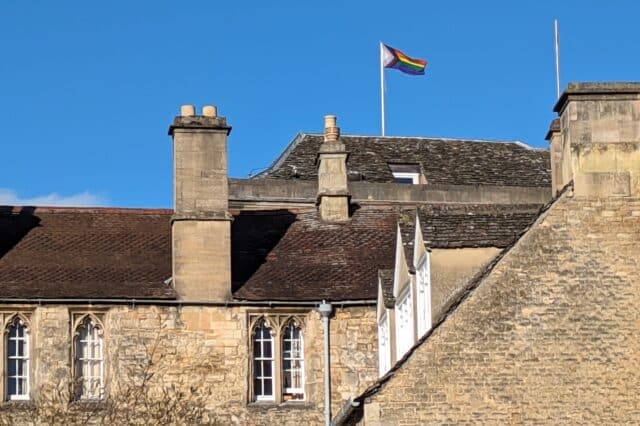 Pride flag flying from buildings
