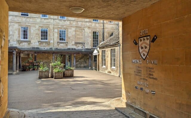 Stone courtyard with flower-filled planters