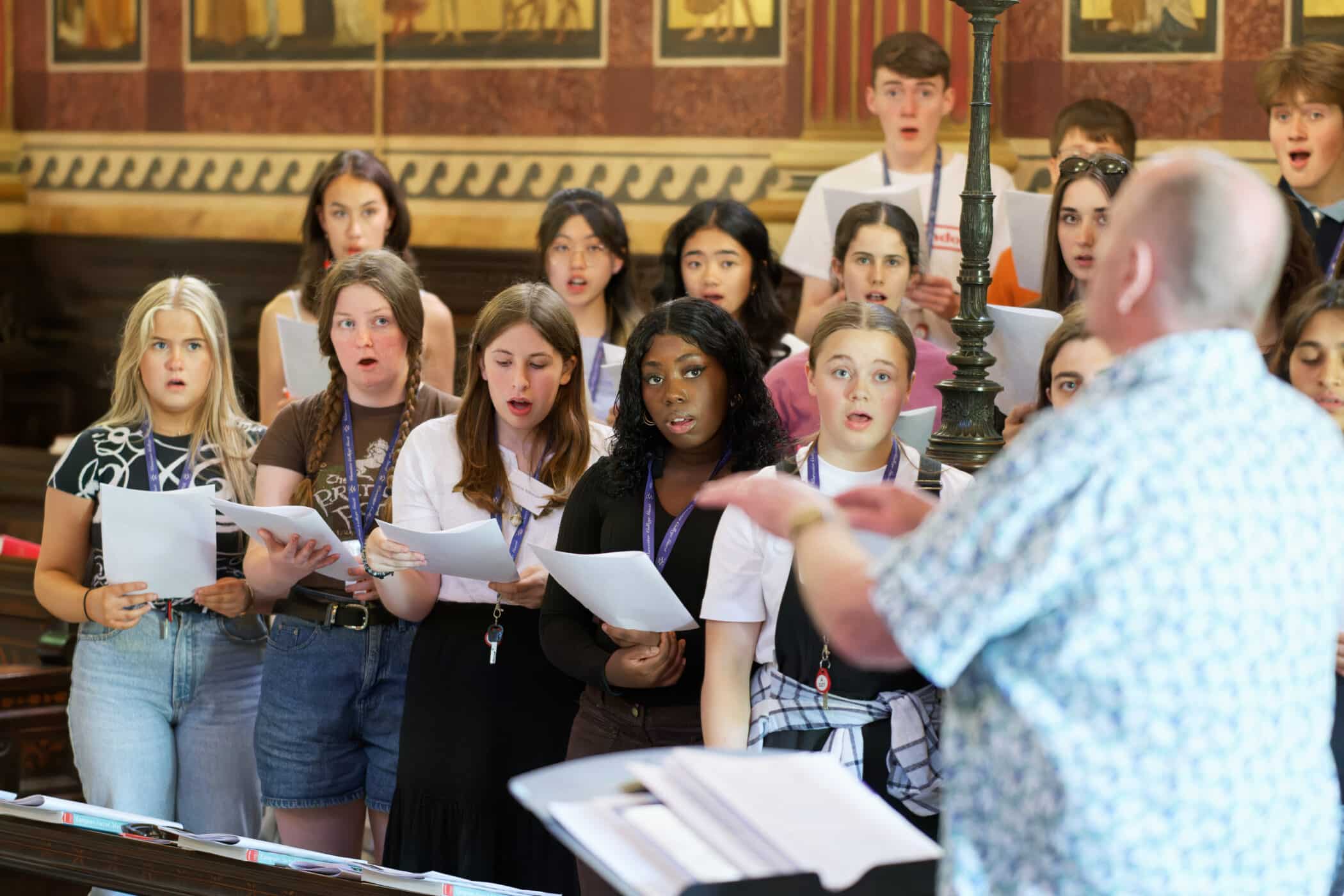 Students singing in the Chapel