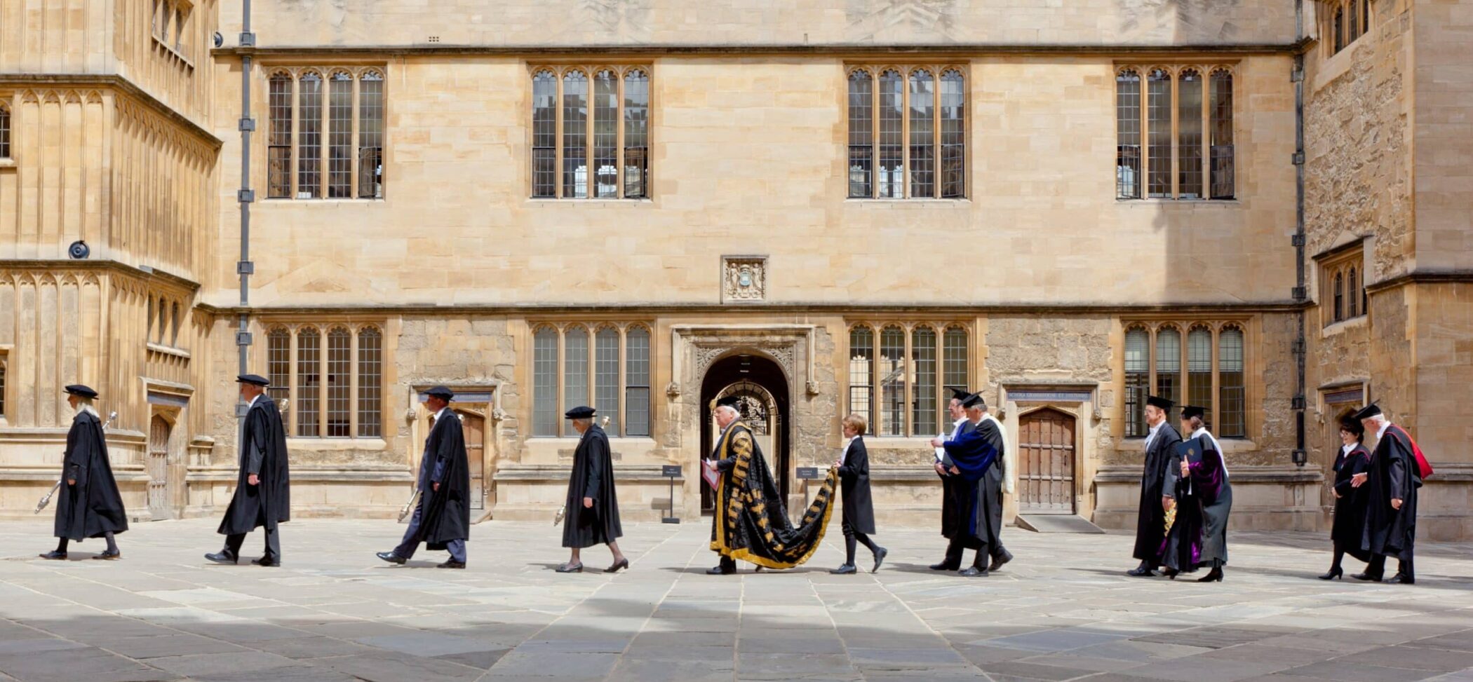 Chancellor processing through the Bodleian quadrangle