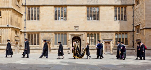 Chancellor processing through the Bodleian quadrangle