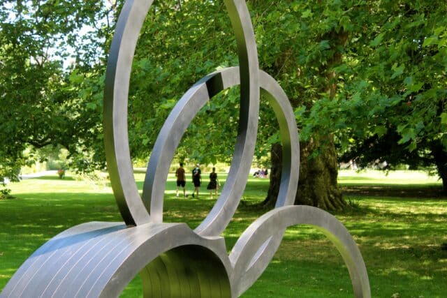 Close up of contemporary bronze sculpture of intersecting ovoids
