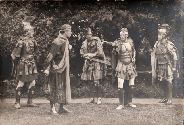 Black and white photograph of students in Roman costume