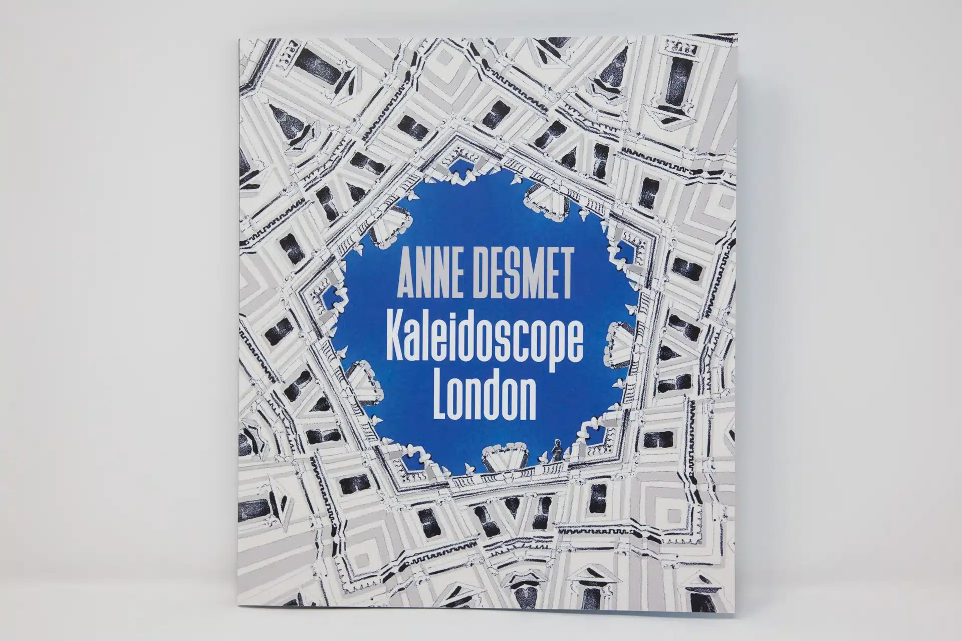 Anne Desmet Kaleidoscope London graphic with monochrome illustrations of buildings forming a pentagon