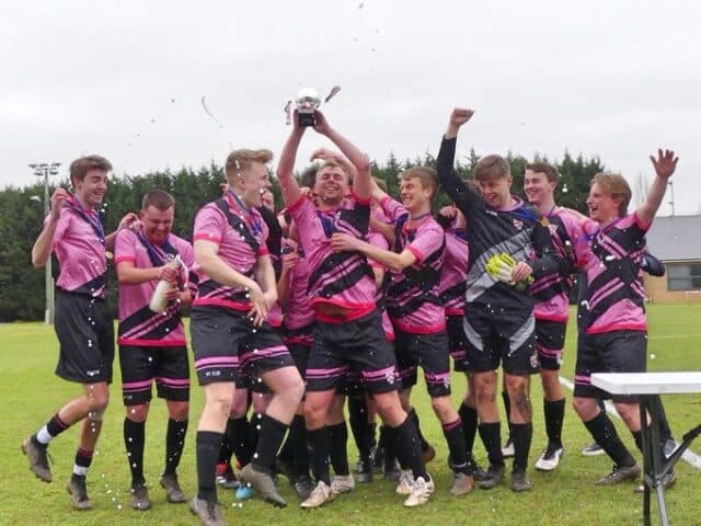 Football team celebrating victory