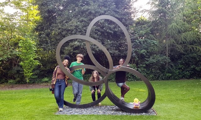 Access Team members with Nigel Hall's sculpture 'Mirrored'