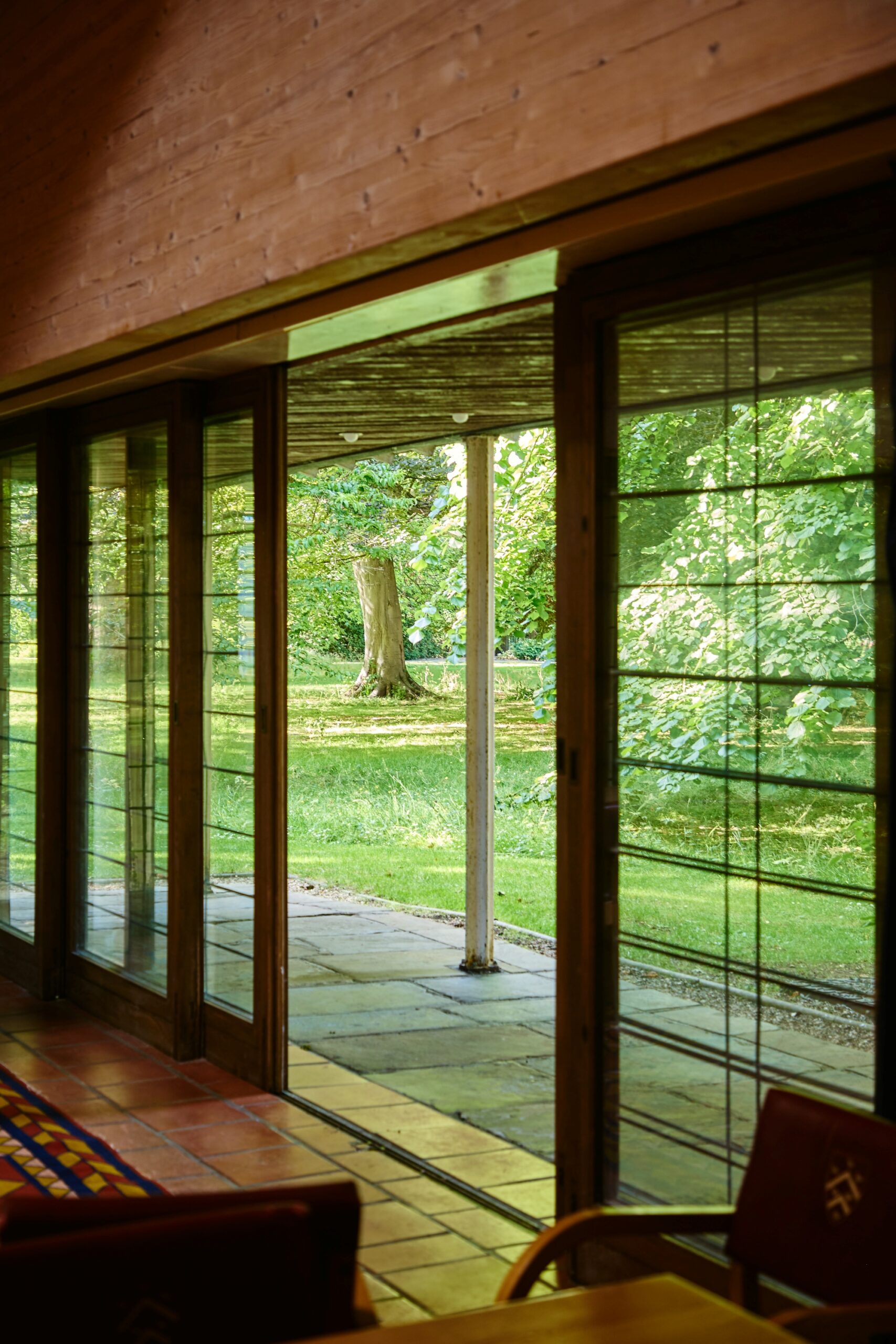 View through open glass doors of Linbury Building